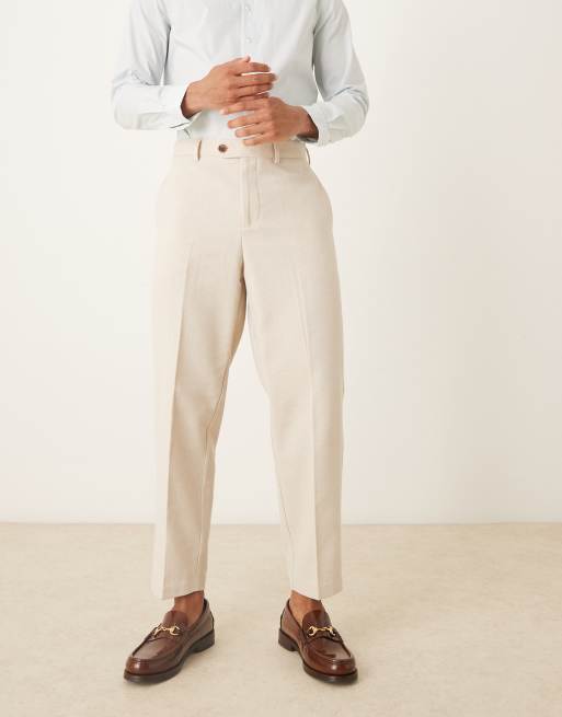 Pantalones de vestir color crema de corte tapered holgado de mezcla de lana de ASOS DESIGN