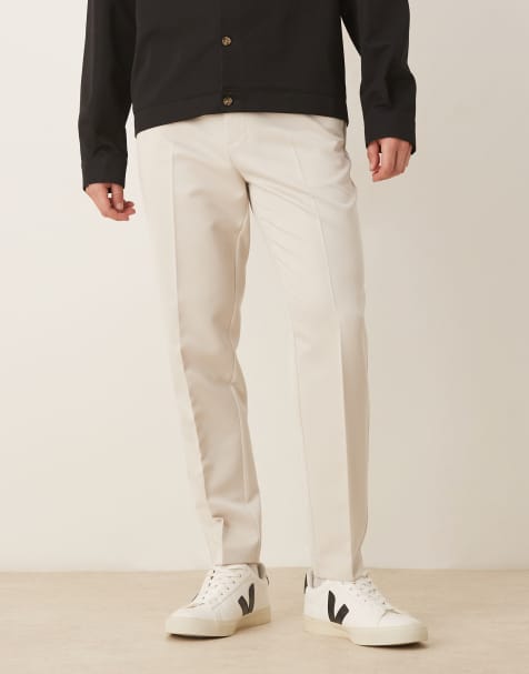 Pantalones de vestir color crudo de corte tapered con cinturilla elástica de ASOS DESIGN - view 1