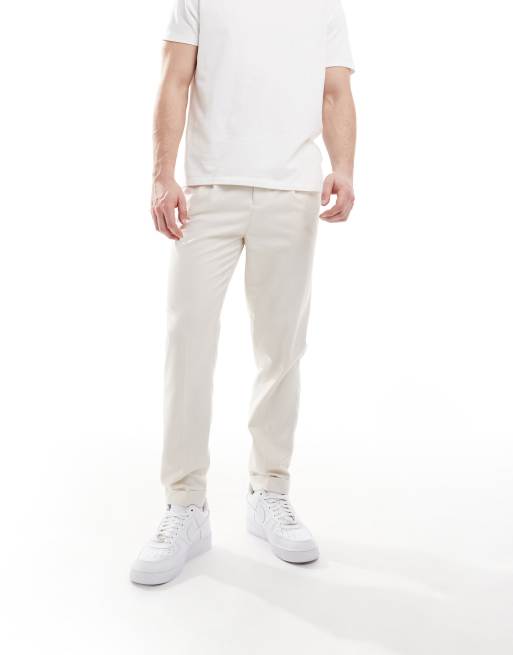 Pantalones de vestir color crudo de corte tapered de tejido microtexturizado de ASOS DESIGN