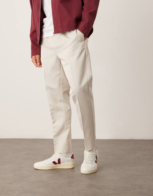 Pantalones de vestir color piedra de corte tapered sin cierres de ASOS DESIGN