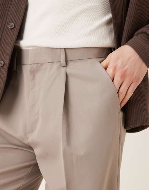 Pantalones de vestir color piedra oscuro de corte tapered extragrande con pinzas de ASOS DESIGN