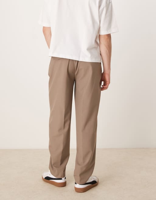 ASOS DESIGN smart oversized tapered trousers with deep pleat in tan