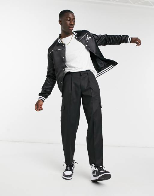 Pantalones de vestir extragrandes con corte tapered estilo cargo negros de ASOS DESIGN