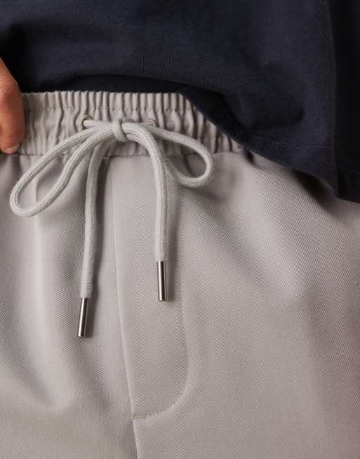 Pantalones de vestir grises de corte tapered sin cierres de ASOS DESIGN, 3 de 5