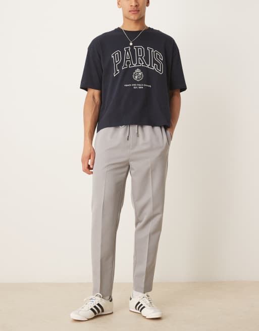 Pantalones de vestir grises de corte tapered sin cierres de ASOS DESIGN, 4 de 5
