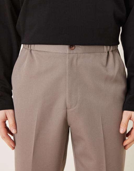 Pantalones de vestir marrones de corte tapered con cintura elástica de ASOS DESIGN, 5 de 5
