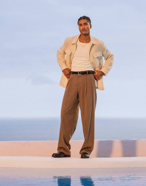 Pantalones de vestir marrones de pernera ancha con pinzas dobles de ASOS DESIGN - view 1