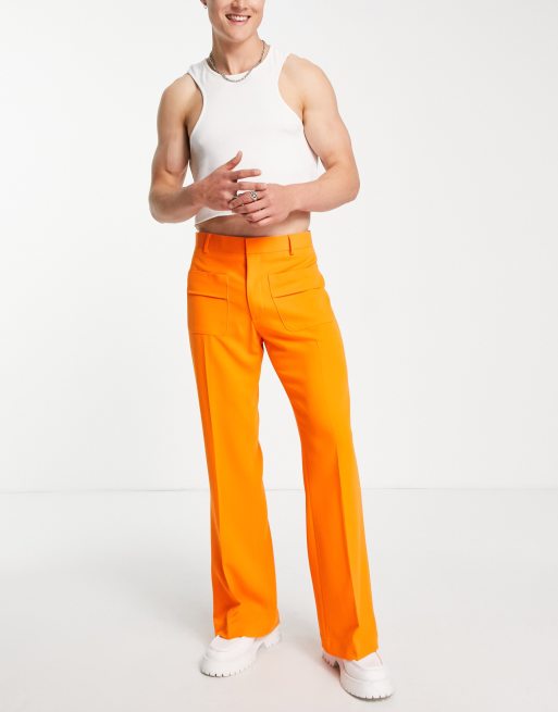 Pantalones de vestir naranjas de campana con bolsillos en la parte delantera de ASOS DESIGN