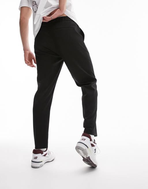 Pantalones de vestir negros de corte tapered con cinturilla elástica de Topman, 3 de 4