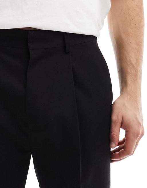 Pantalones de vestir negros de corte tapered de ASOS DESIGN, 5 de 5