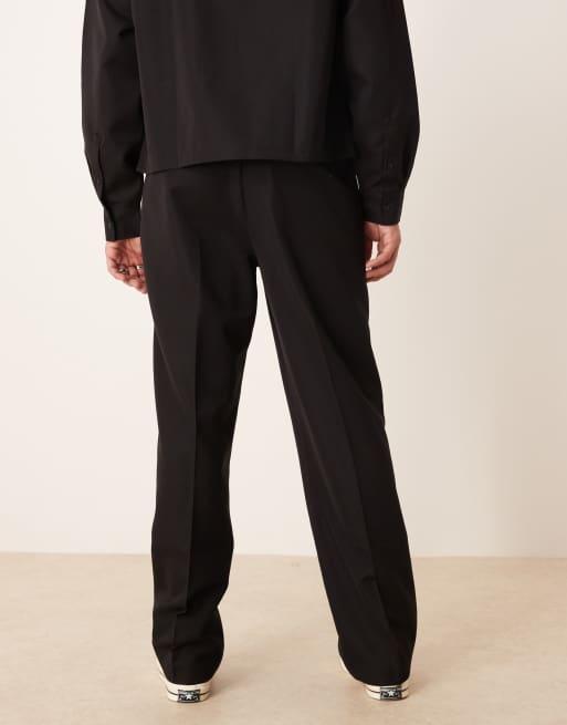 Pantalones de vestir negros de pernera ancha con pinzas delanteras de ASOS DESIGN, 4 de 5