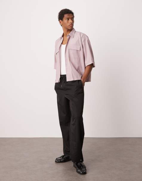 Pantalones de vestir negros de pernera ancha sin cierres con botones de presión en el bajo de ASOS DESIGN - view 1