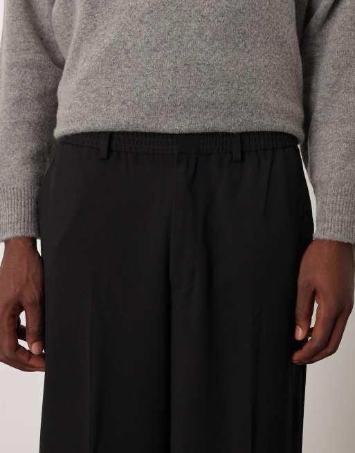 Pantalones de vestir negros sin cierres de corte tapered extragrande de ASOS DESIGN, 5 de 5