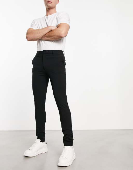 Pantalones de vestir superajustados en negro de ASOS DESIGN