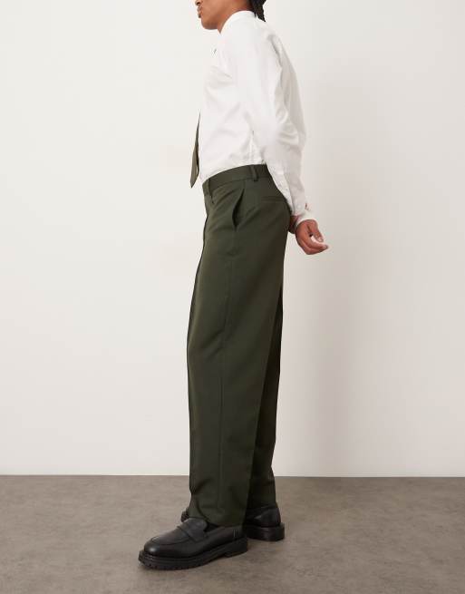 Pantalones de vestir verde oscuro de corte tapered holgado con jaretas de ASOS DESIGN, 3 de 5