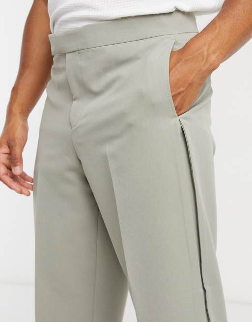 Pantalones elegantes de corte tapered extragrande con pliegues y detalle de puños de ASOS DESIGN, 3 de 4