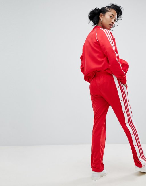 Pantalones en rojo con botones de presión adicolor Adibreak de adidas  Originals