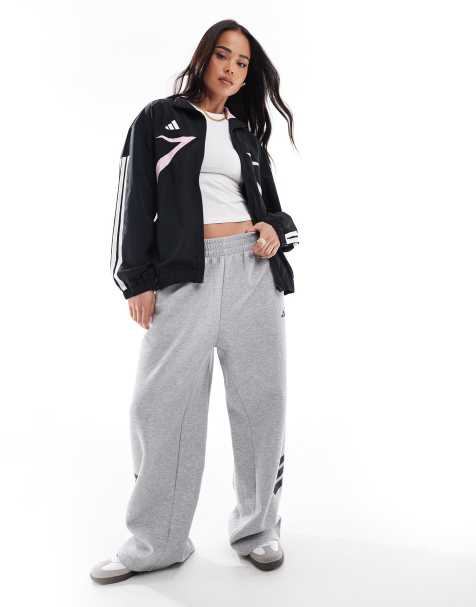 Pantalones gris medio jaspeado con bajos abiertos y detalle de 3 rayas Future Icons de adidas - view 1