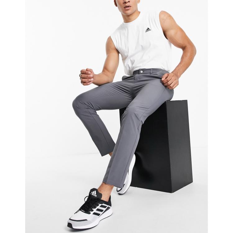 Pantalones gris oscuro de tejido elástico en direcciones