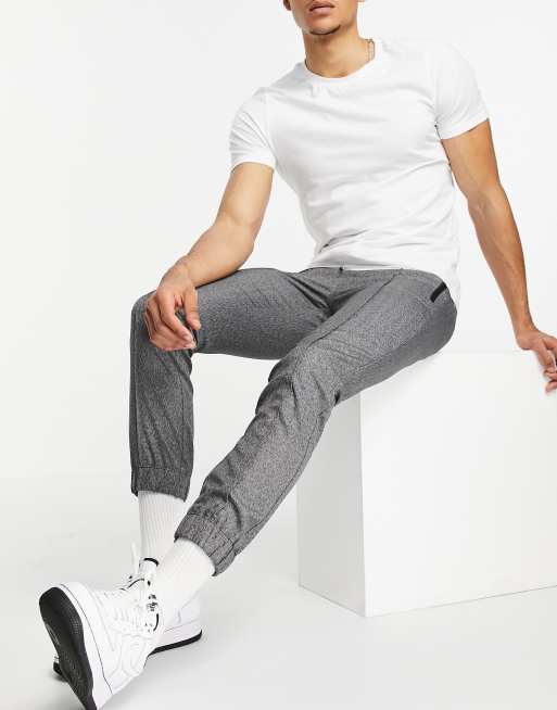 Pantalones grises de corte slim con cinturilla elástica y diseño texturizado de ASOS DESIGN, 4 de 4