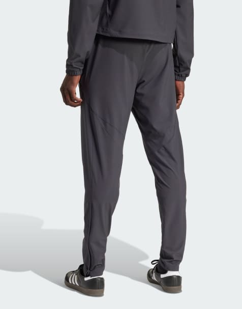 Pantalones grises de viaje con diseño del Arsenal Tiro 25 Competition Vis Tech de adidas Performance - view 1