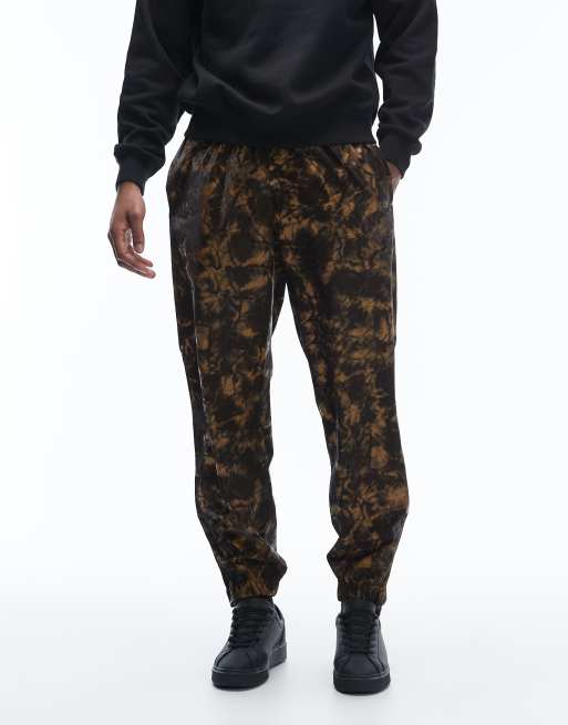 Pantalones impermeables con estampado abstracto fangoso y cordón ajustable 18560 de Rains, 2 de 5