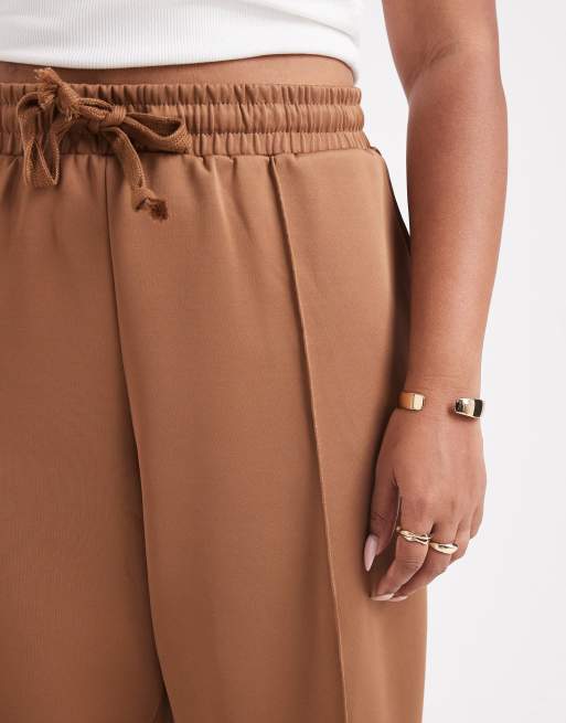 Pantalones marrón claro de pernera recta con raya lateral blanca de punto liso de Noisy May Curve, 4 de 5