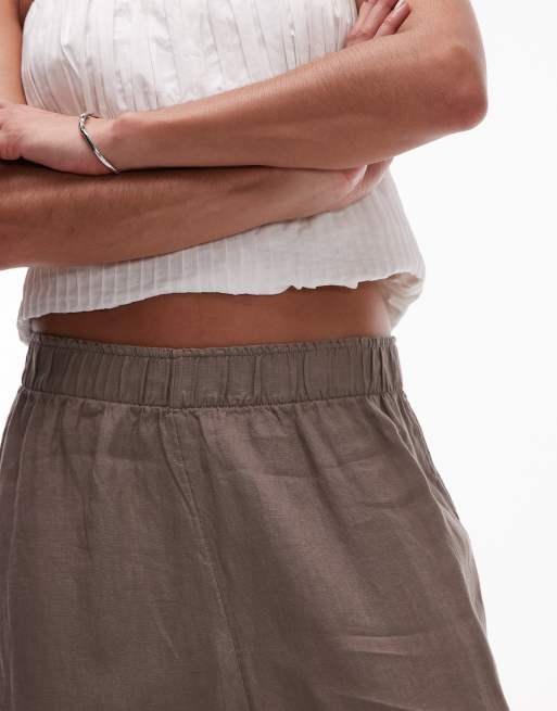 Pantalones marrón moca de corte palazzo con cinturilla sin cierres de lino puro de ARKET, 3 de 5