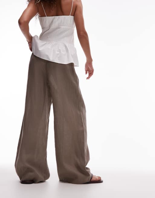 Pantalones marrón moca de corte palazzo con cinturilla sin cierres de lino puro de ARKET, 4 de 5