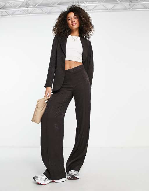 Pantalones marrón oscuro con estampado de leopardo Camou de Scalpers