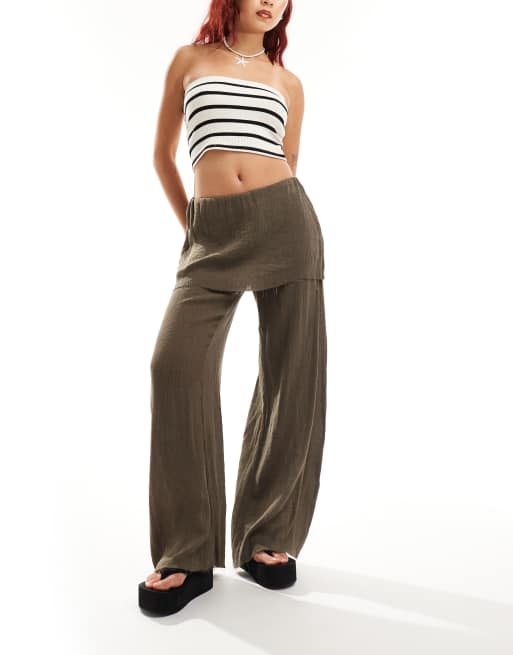 Pantalones marrones con falda de tejido vaporoso Amra de Weekday, 3 de 5