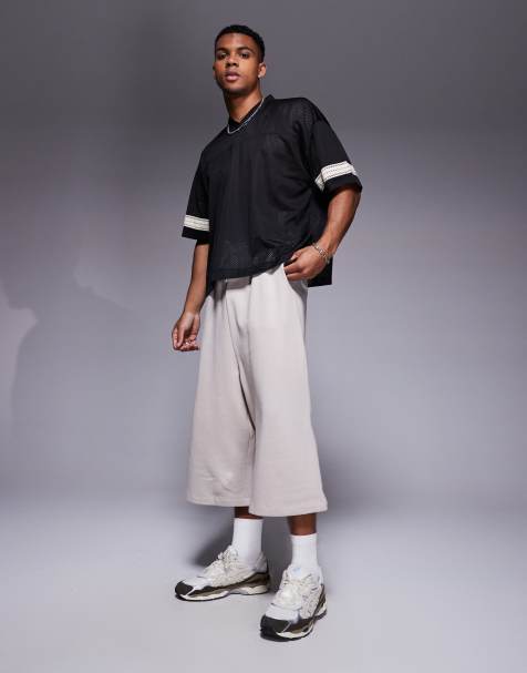 Pantalones marrones de corte alargado de algodón de ASOS DESIGN - view 1