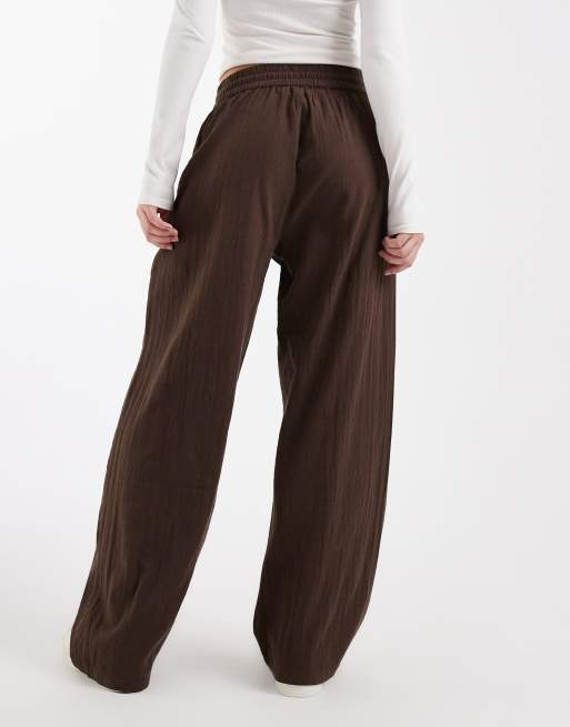 Pantalones marrones de pernera ancha de tejido efecto lino de ONLY, 4 de 5