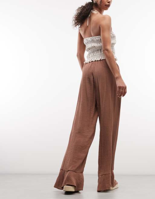 Pantalones marrones de pernera ancha de tejido rugoso de Monki, 5 de 5
