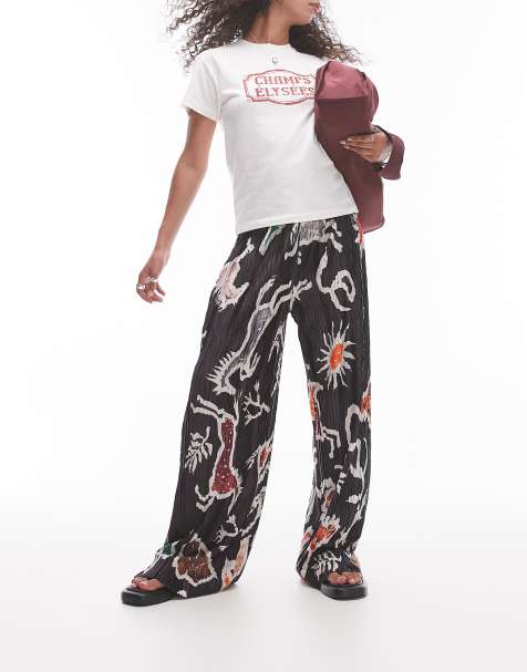 Pantalones multicolores plisados de pernera ancha con estampado abstracto de vaquera de Topshop - view 1