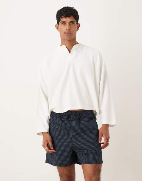 Pantalones muy cortos azul marino sin cierres con raya diplomática de ASOS DESIGN - view 1