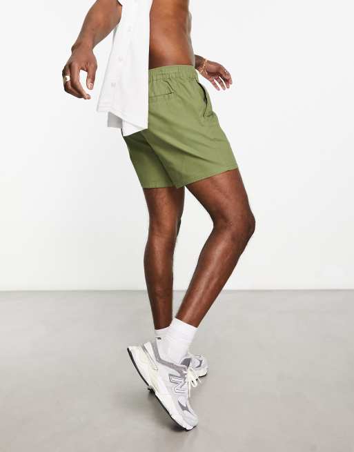 Pantalones muy cortos chinos caqui oscuro de corte slim de ASOS DESIGN, 2 de 4