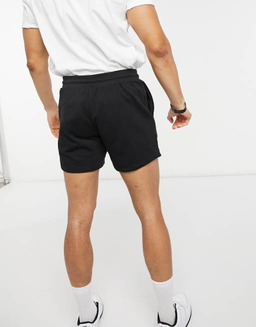 Pantalones muy cortos de punto de corte slim en negro de ASOS DESIGN, 2 de 4