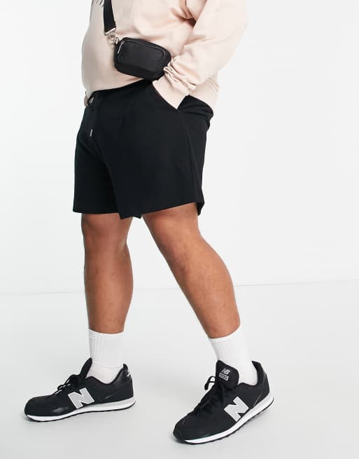 Pantalones muy cortos de punto de corte slim en negro de ASOS DESIGN, 4 de 4