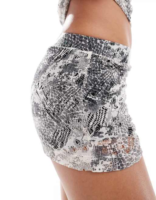 Pantalones estampado serpiente best sale