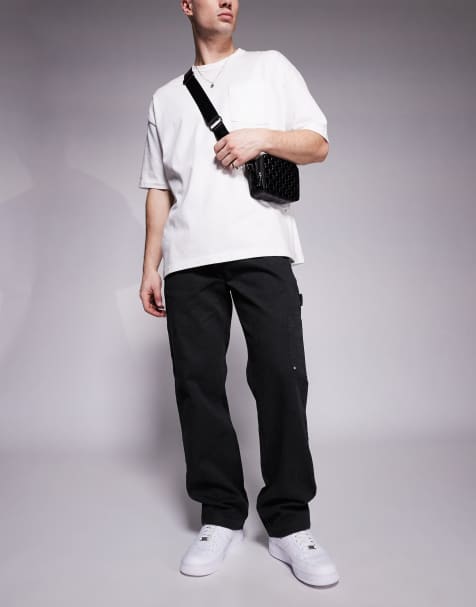Pantalones negro lavado con parches dobles de sarga de The Couture Club - view 1