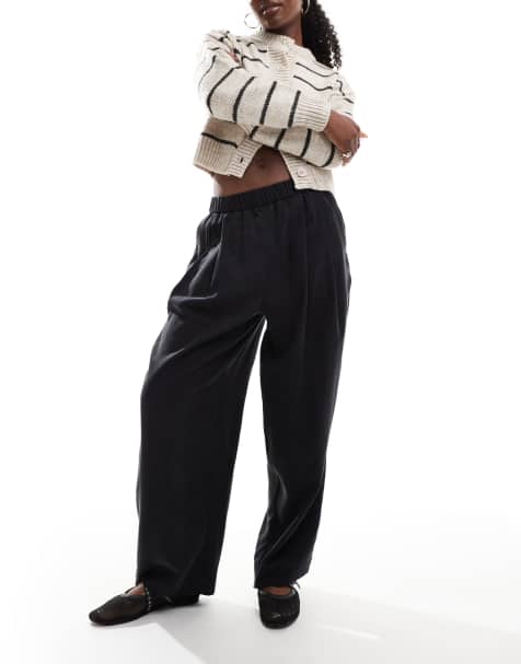 Pantalones negro lavado de estilo casual sin cierres con pinzas premium de ASOS DESIGN - view 1