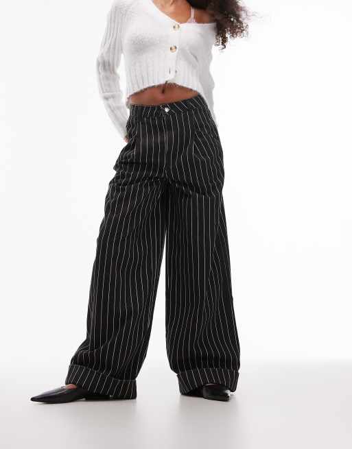 Pantalones negros con rayas sale