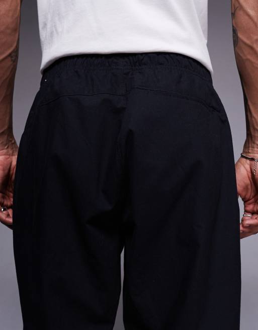 Pantalones negros con bajos ajustables Club Barcelona de Nike, 5 de 5