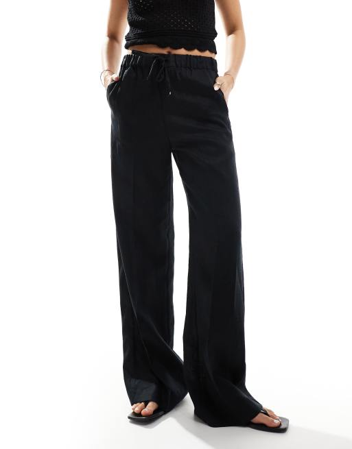 Pantalones negros con cordón ajustable de lino de Mango