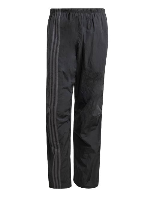 Pantalones negros con cremallera y lateral de malla Fashion de