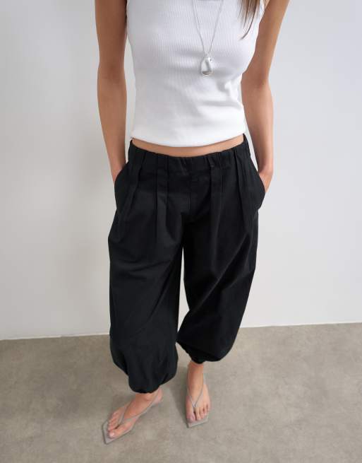 Pantalones negros de corte globo de popelina de Topshop, 5 de 5