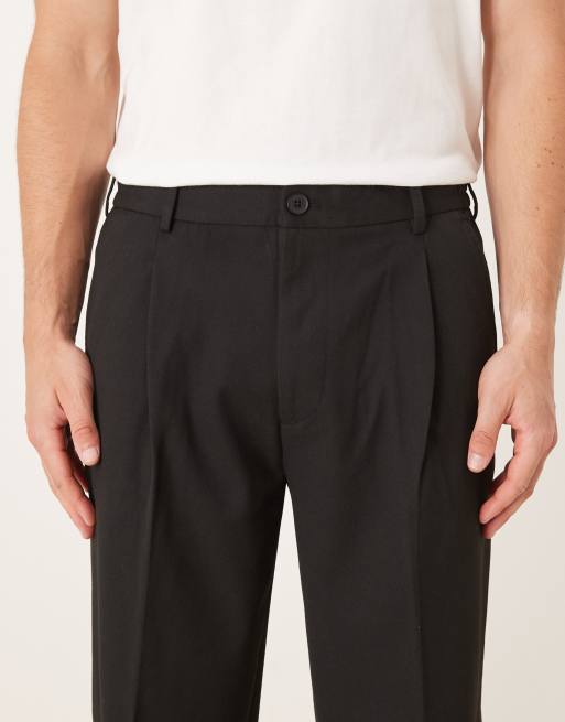 Pantalones negros de corte suelto con pinzas de Selected , 5 de 5