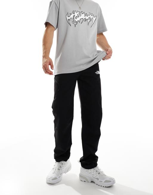 Pantalones negros de corte tapered con bolsillo cargo Exploration de The North Face, 3 de 5