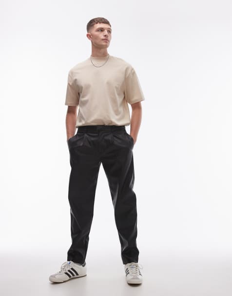 Pantalones negros de corte tapered de cuero sintético de Topman - view 1